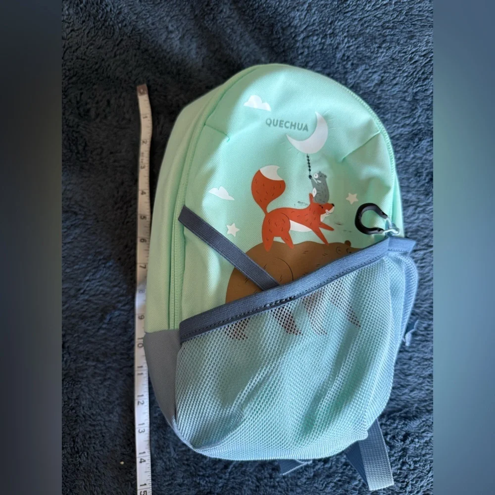 Kids turquoise and blue soft animal backpack - has minor black spots as pictured
